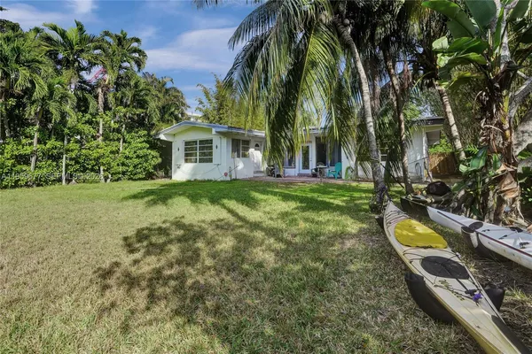 a view of a garden with a lake