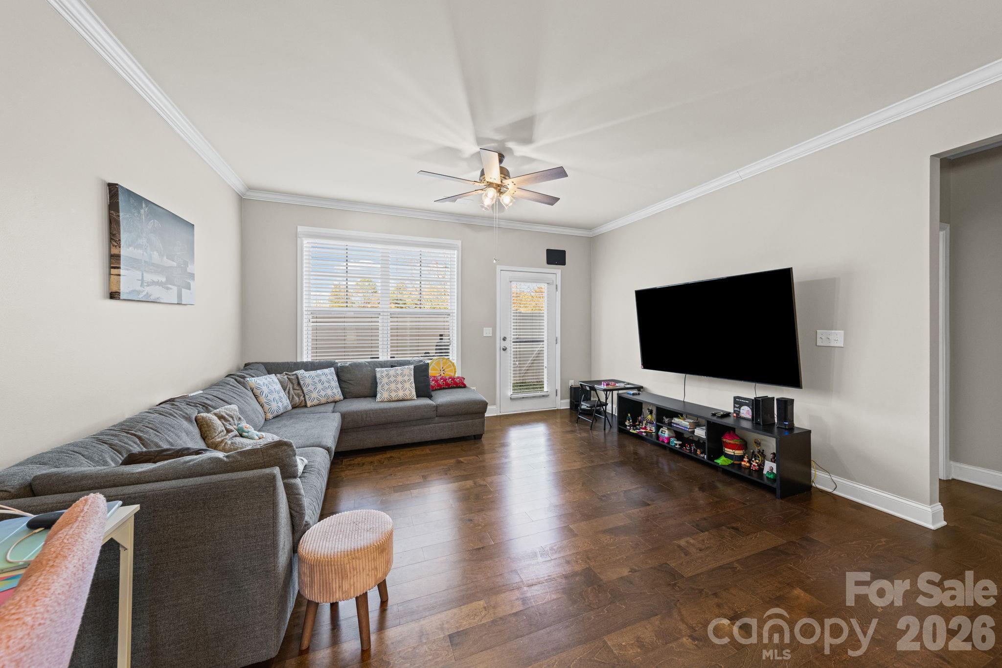 1425 Bramblewood Drive Fort Mill, SC 29708 - Photo 11 of 44 a living room with furniture and a flat screen tv