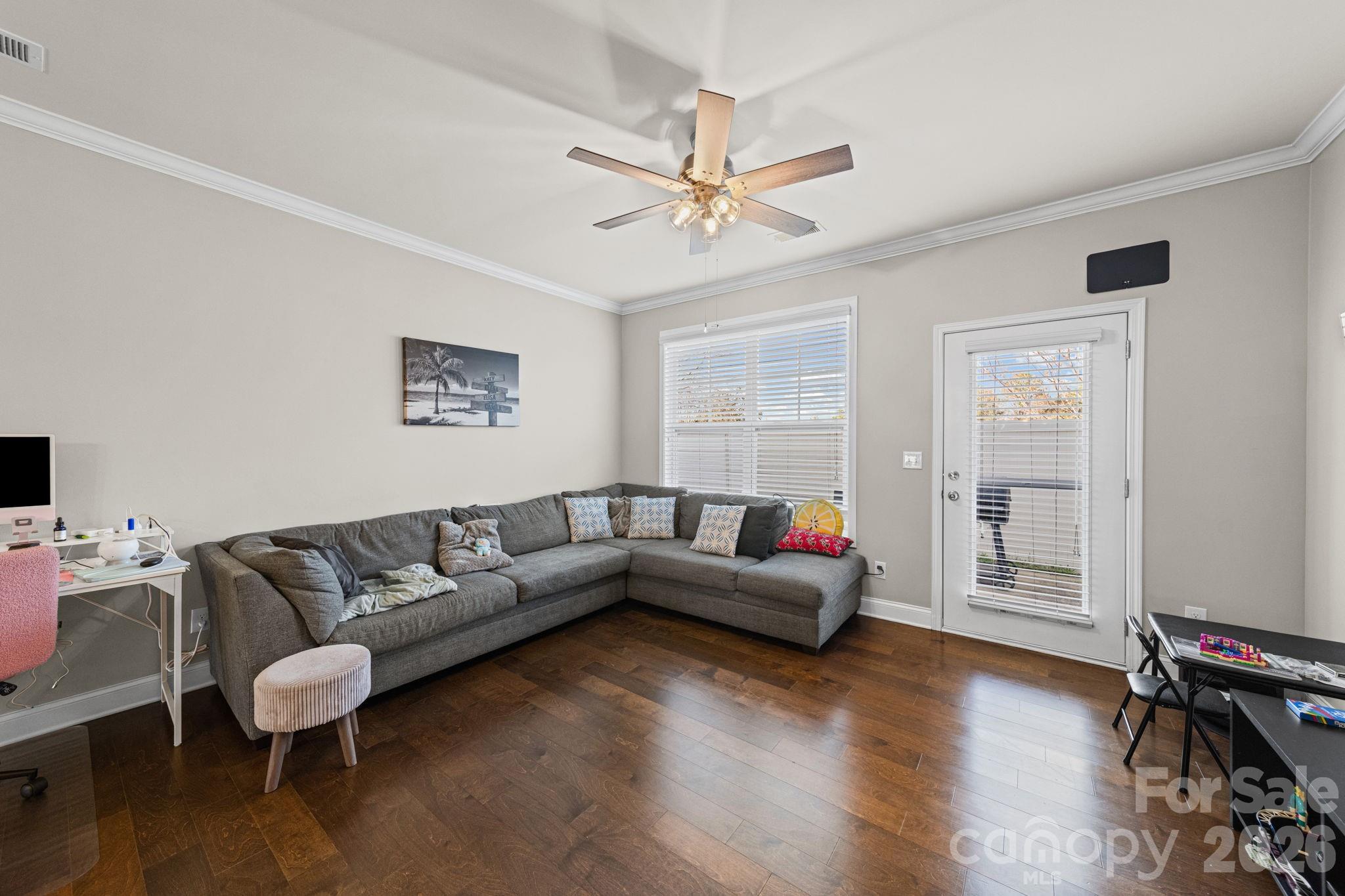 1425 Bramblewood Drive Fort Mill, SC 29708 - Photo 12 of 44 a living room with furniture and a wooden floor