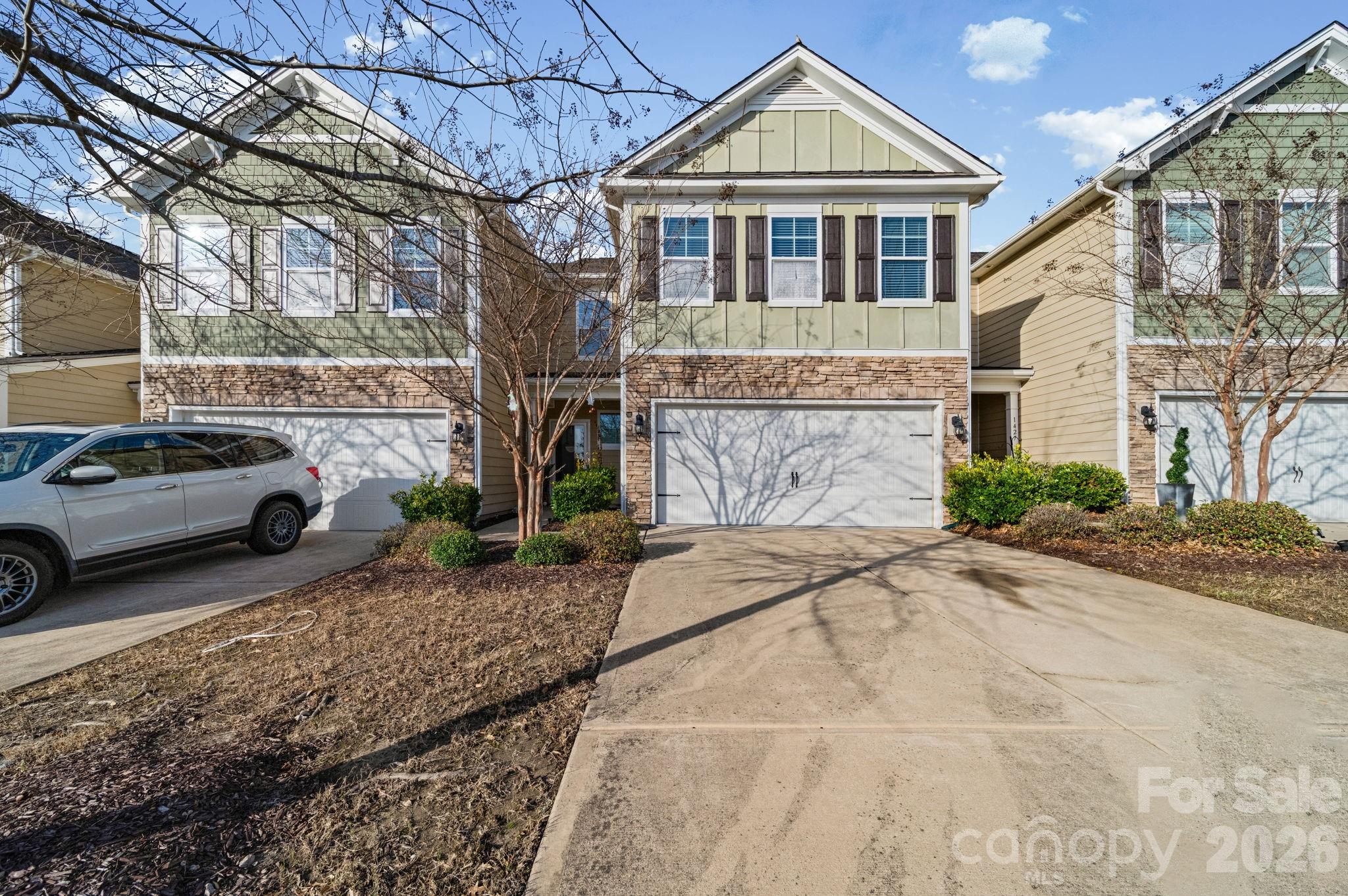 1425 Bramblewood Drive Fort Mill, SC 29708 - Photo 3 of 44 a front view of a house with a yard