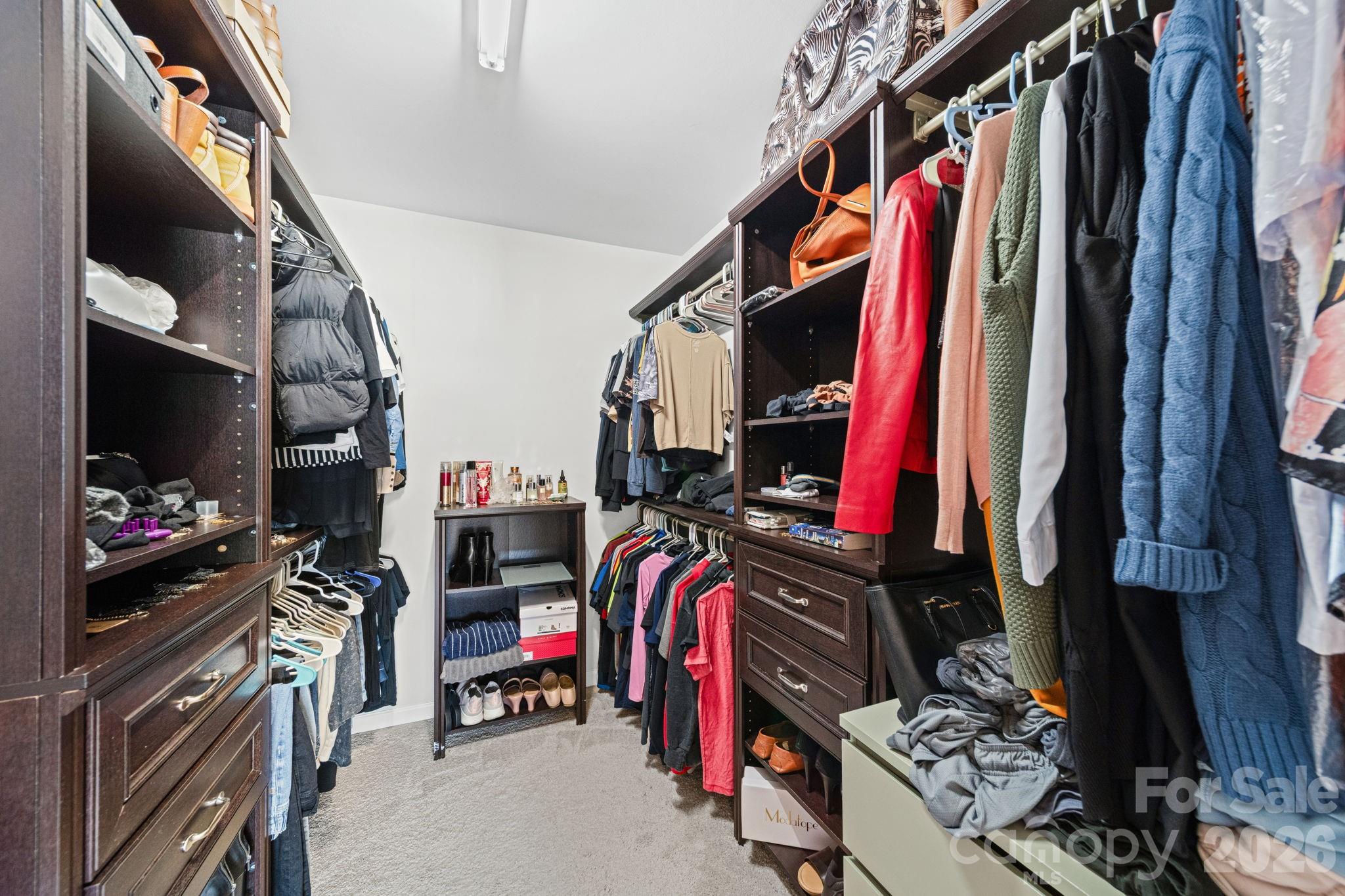 1425 Bramblewood Drive Fort Mill, SC 29708 - Photo 31 of 44 a view of walk in closet with clothes and shoes