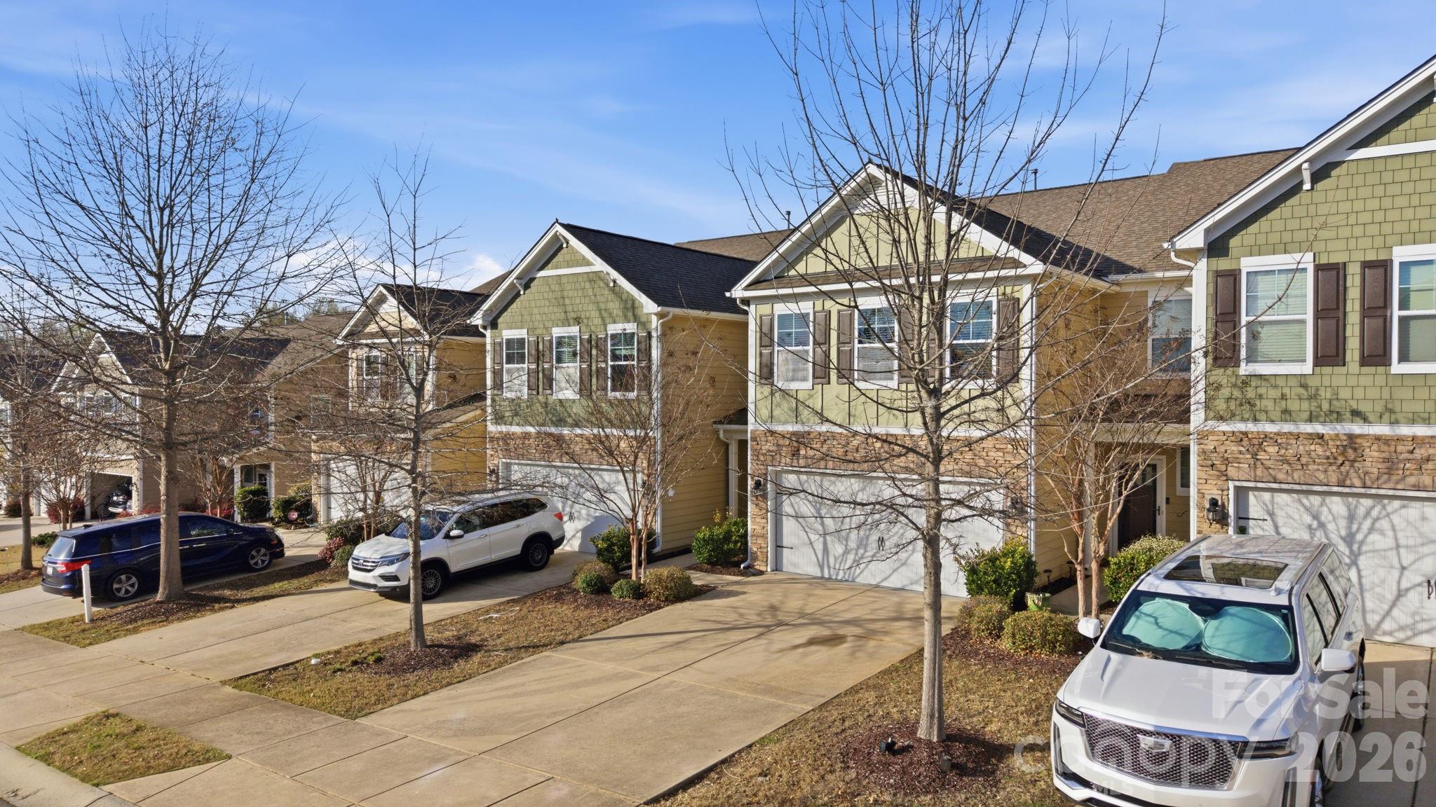 1425 Bramblewood Drive Fort Mill, SC 29708 - Photo 4 of 44 a view of multiple houses with a yard
