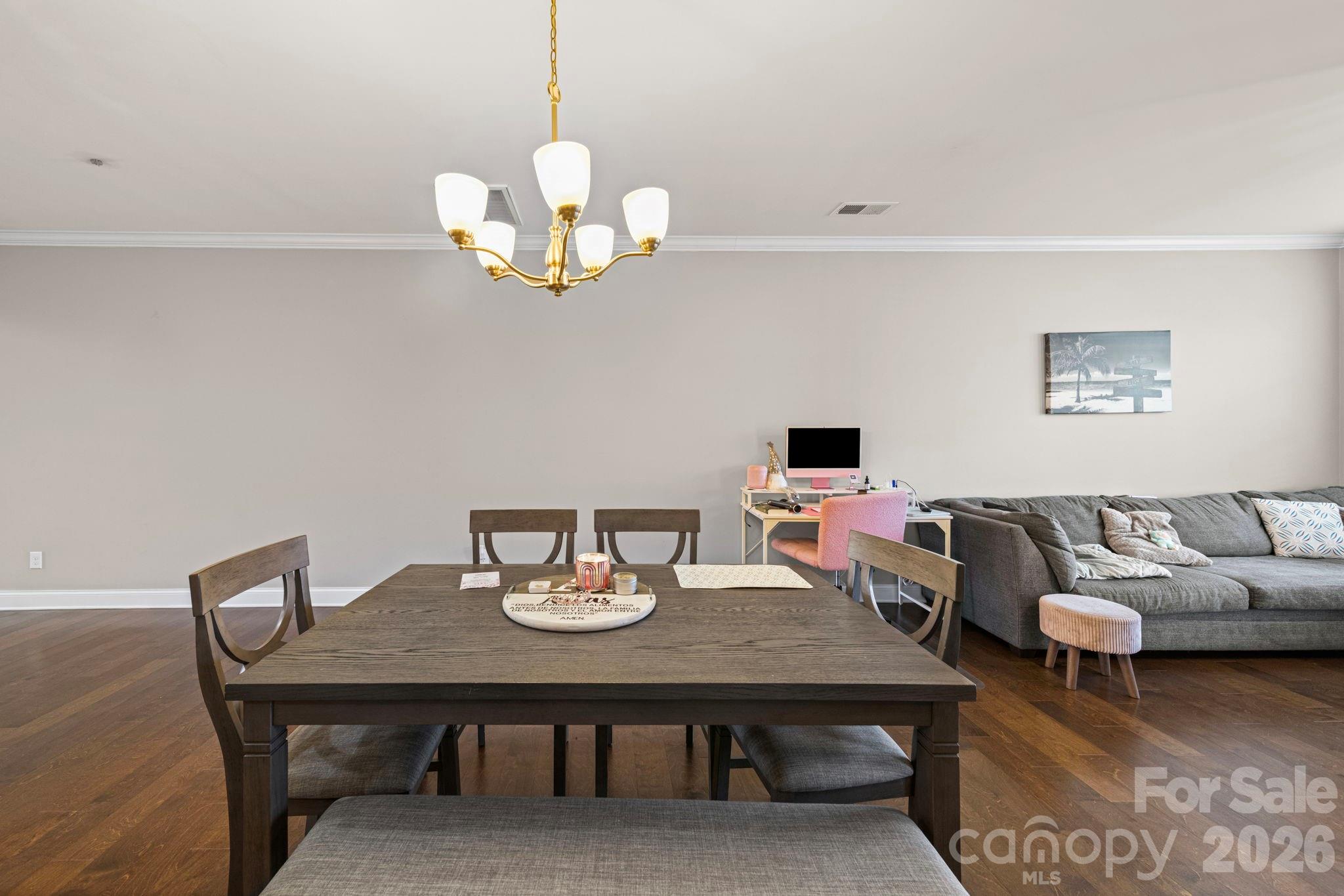 1425 Bramblewood Drive Fort Mill, SC 29708 - Photo 8 of 44 a view of a dining room with a table and chairs