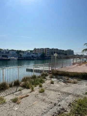 a backyard of a house with lake view