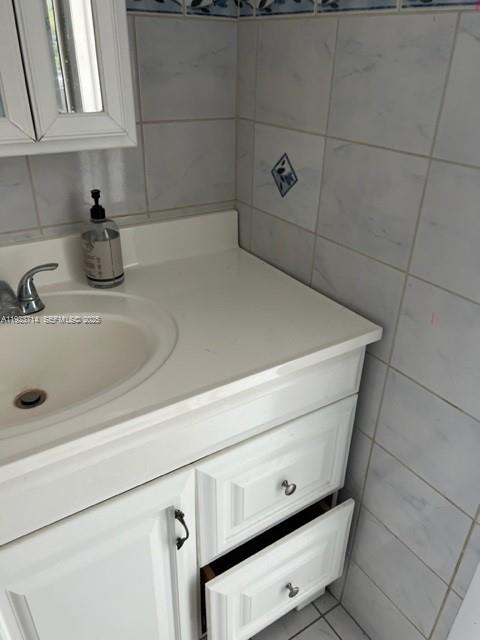 8001 Crespi Boulevard, Unit 2D Miami Beach, FL 33141 - Photo 14 of 20 a close view of a sink in the bathroom