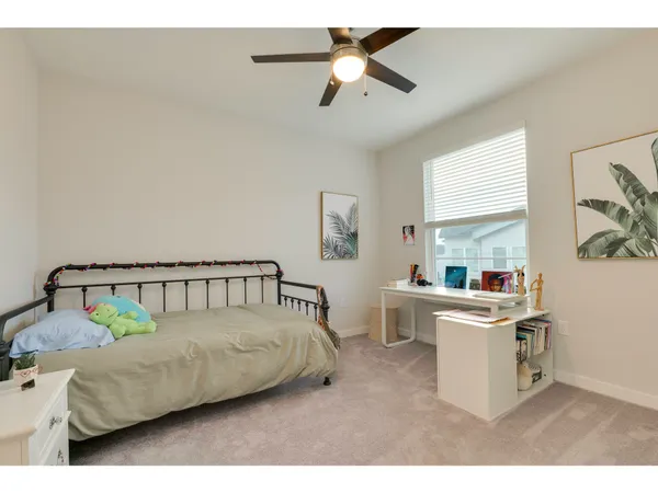 a living room with furniture and flat screen tv