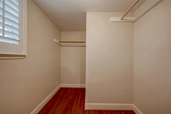 a view of small space with racks on the wall