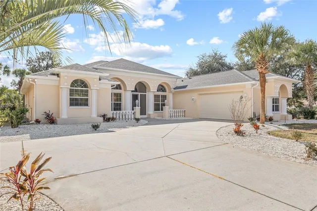 a front view of a house with yard