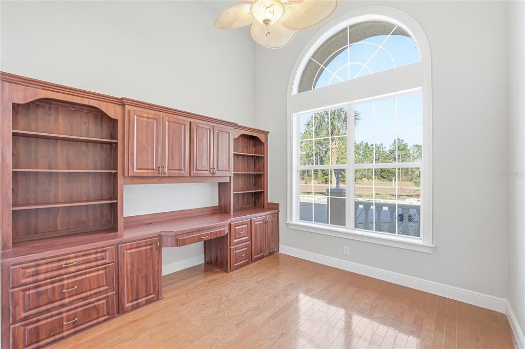 11040 Fulton Avenue Weeki Wachee, FL 34613 - Photo 36 of 77 a room with furniture and a window