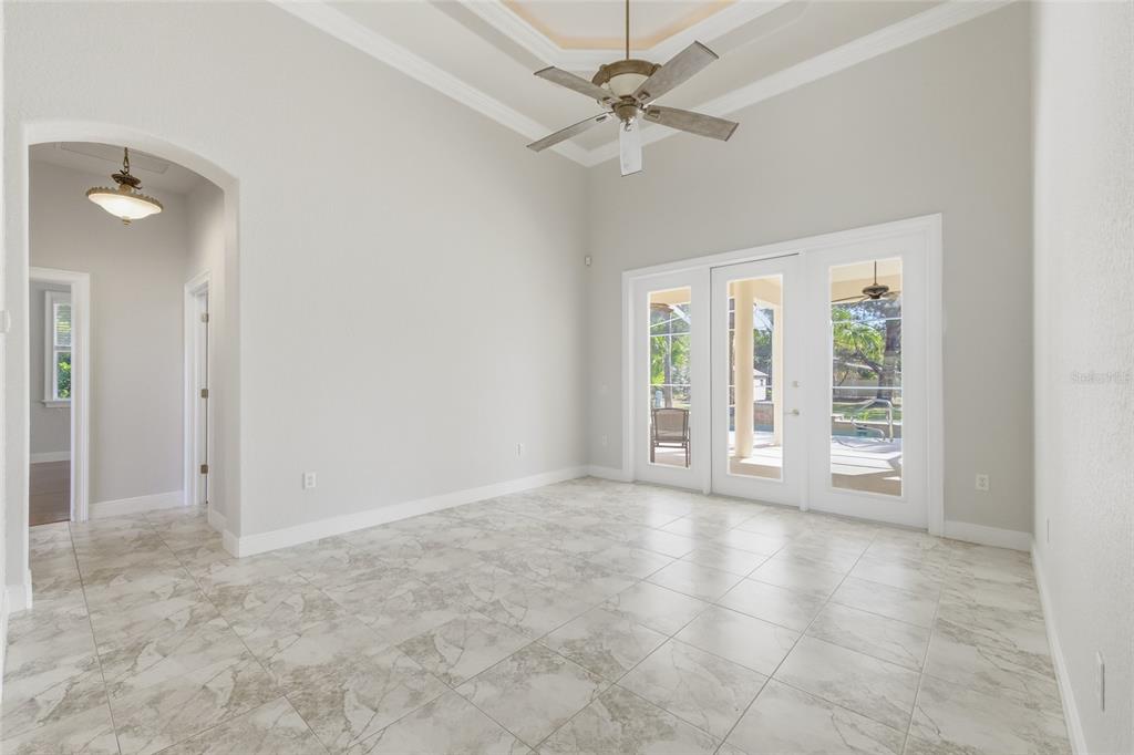 11040 Fulton Avenue Weeki Wachee, FL 34613 - Photo 6 of 77 a view of an empty room with a window