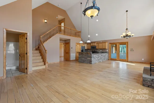 a view of a kitchen with furniture and a fireplace