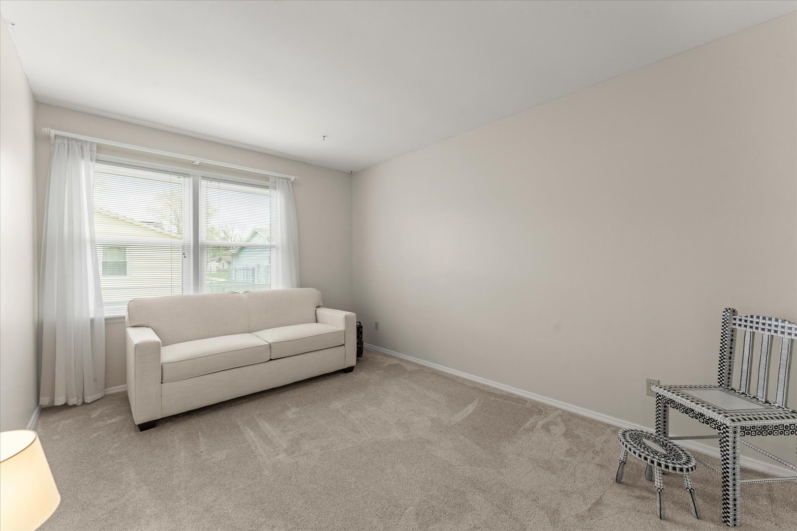 2701 Hathaway Drive Champaign, IL 61821 - Photo 18 of 22 a living room with furniture and a window