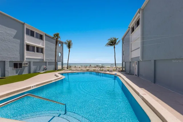 a view of a balcony with chairs
