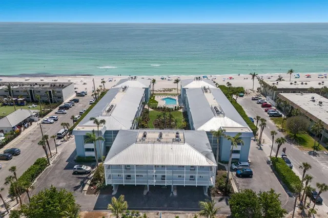 a bathroom with a sink mirror and vanity