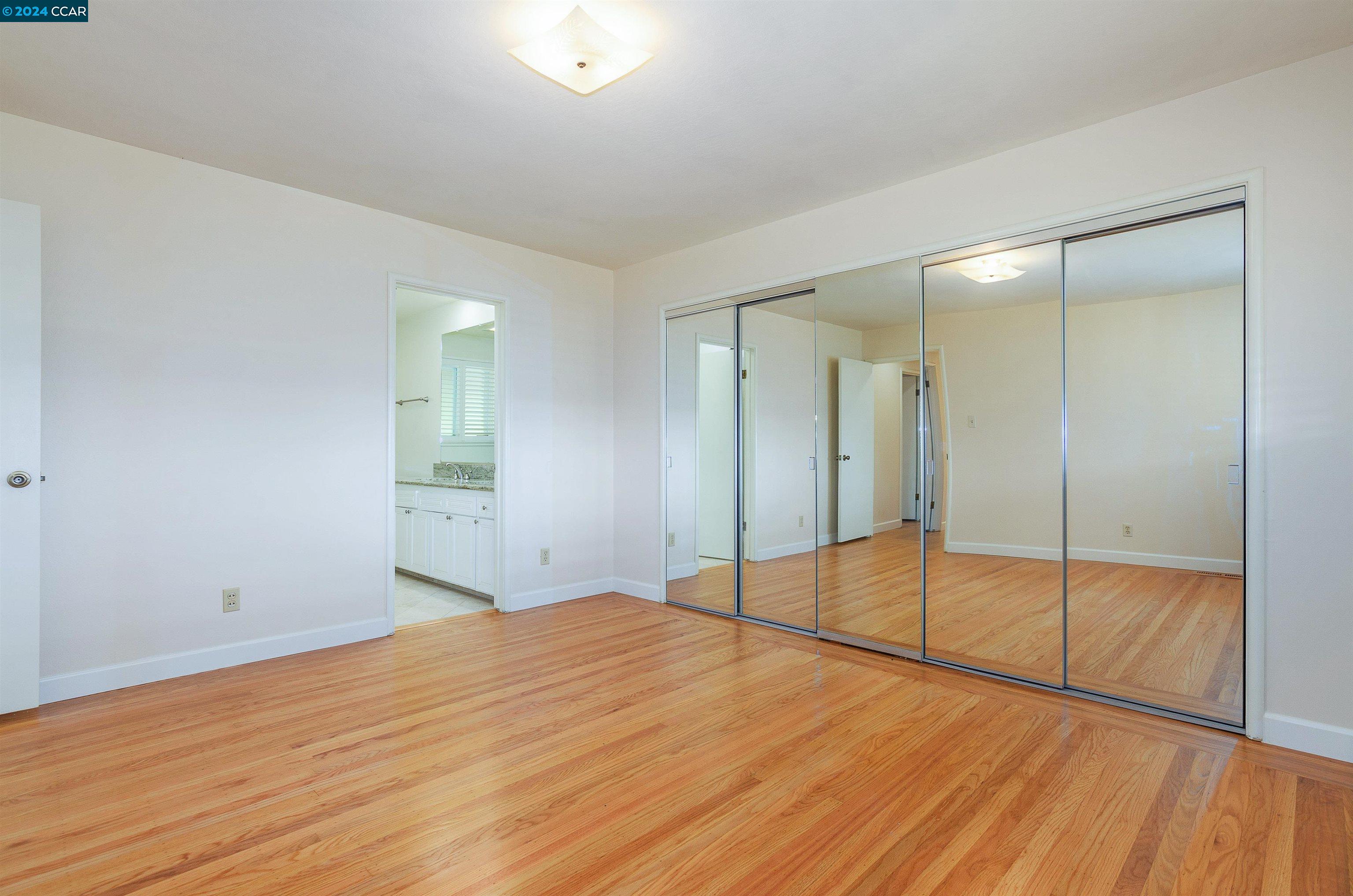 32 Diablo Circle Lafayette, CA 94549 - Photo 16 of 18 a view of an empty room and wooden floor