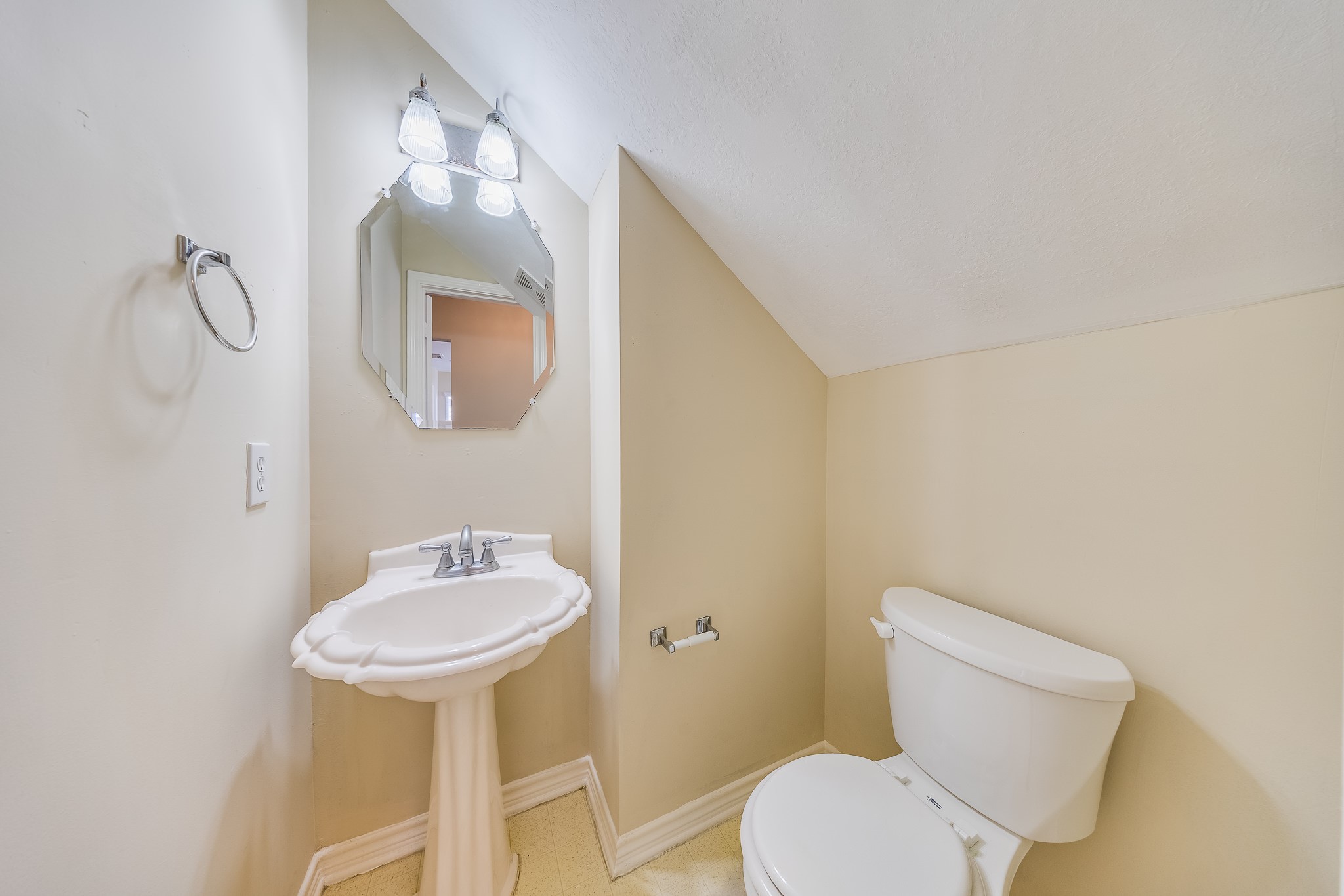 20003 Rustic Lake Lane Cypress, TX 77433 - Photo 18 of 21 a bathroom with a toilet sink and mirror