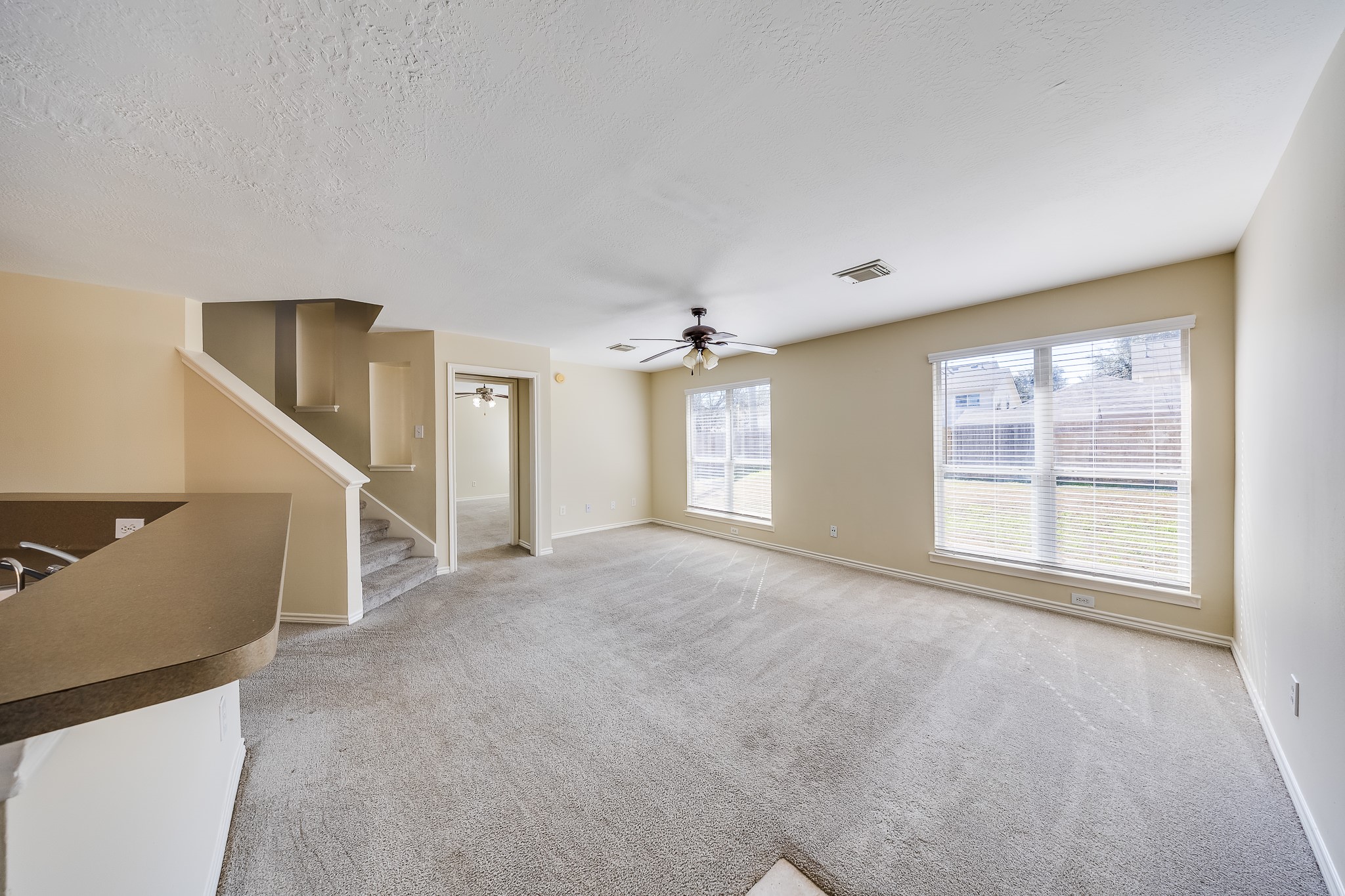 20003 Rustic Lake Lane Cypress, TX 77433 - Photo 2 of 21 a view of an empty room with a window