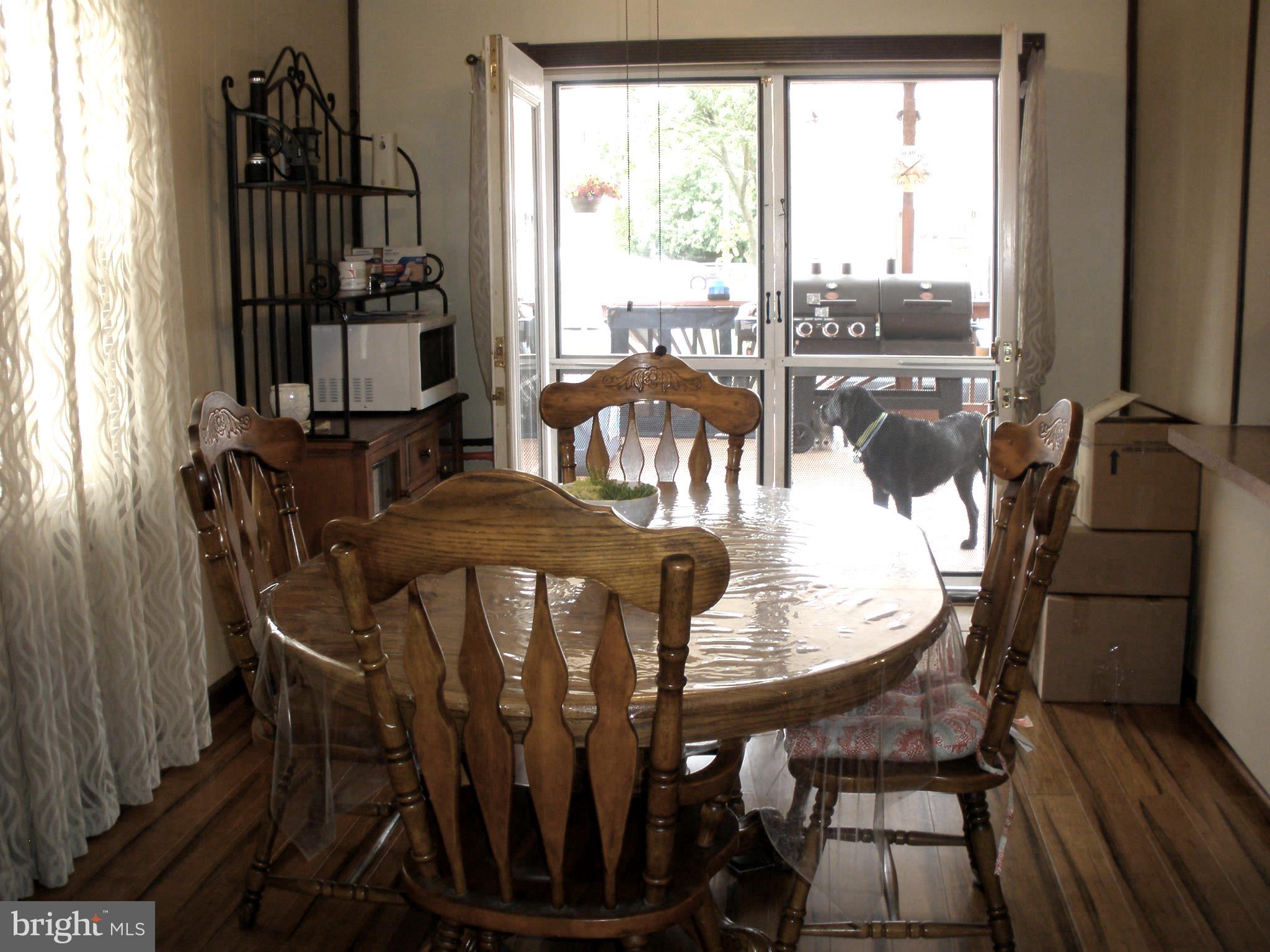 2220 Vailthorn Road Baltimore, MD 21220 - Photo 6 of 34 Dining Room w/ French Doors to Deck