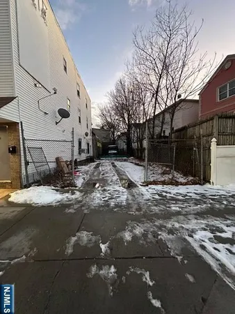 a view of a street with a building
