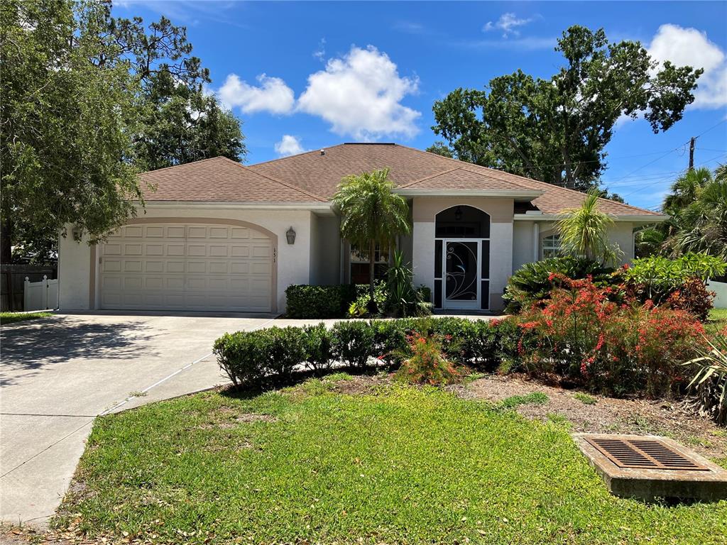151 Wisteria Road Venice, FL 34293 - Photo 1 of 1 a front view of a house with a garden