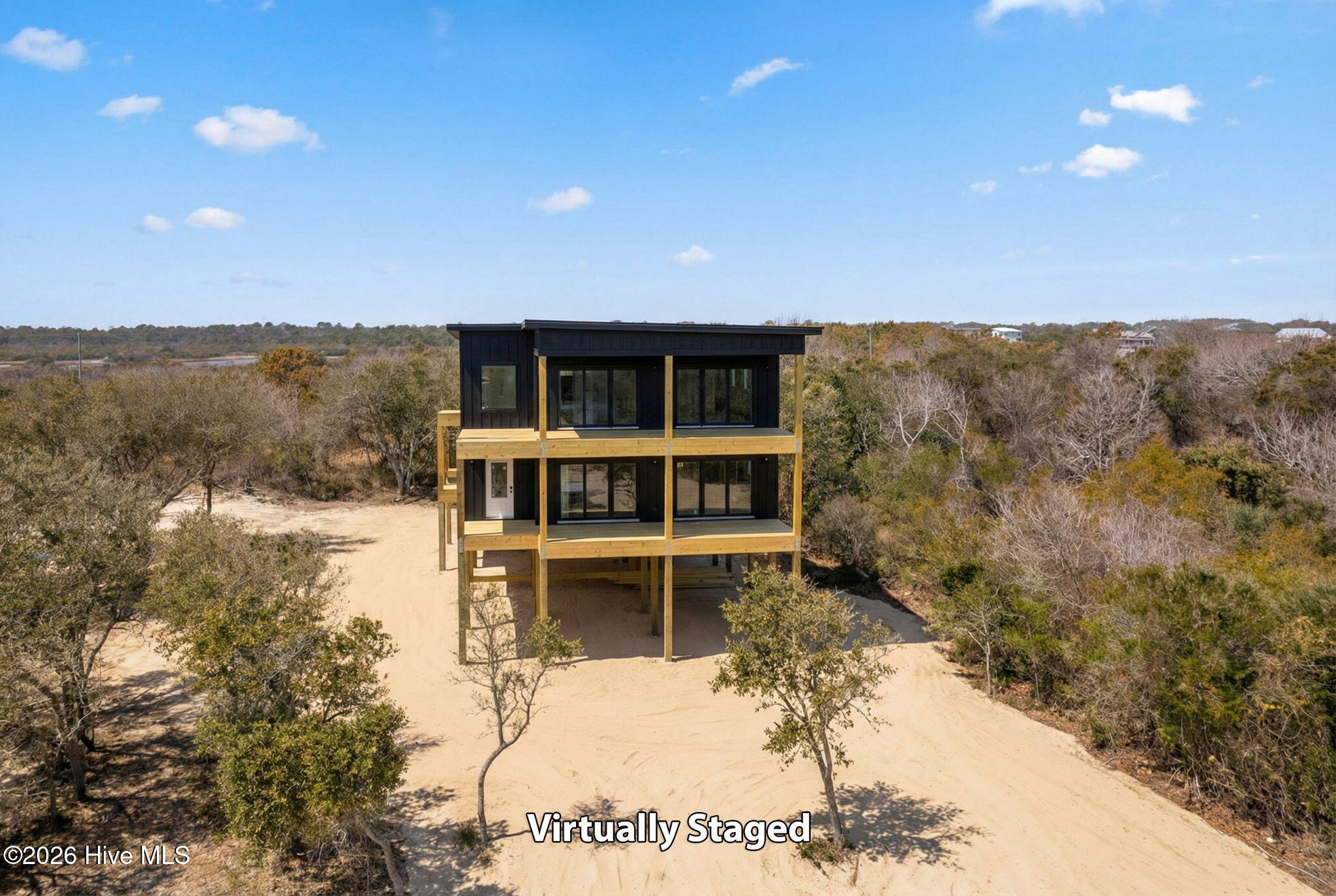 2088 Sandpiper Road Corolla, NC 27927 - Photo 3 of 22 5-web-or-mls-2088-Sandpiper-Front-Exteri