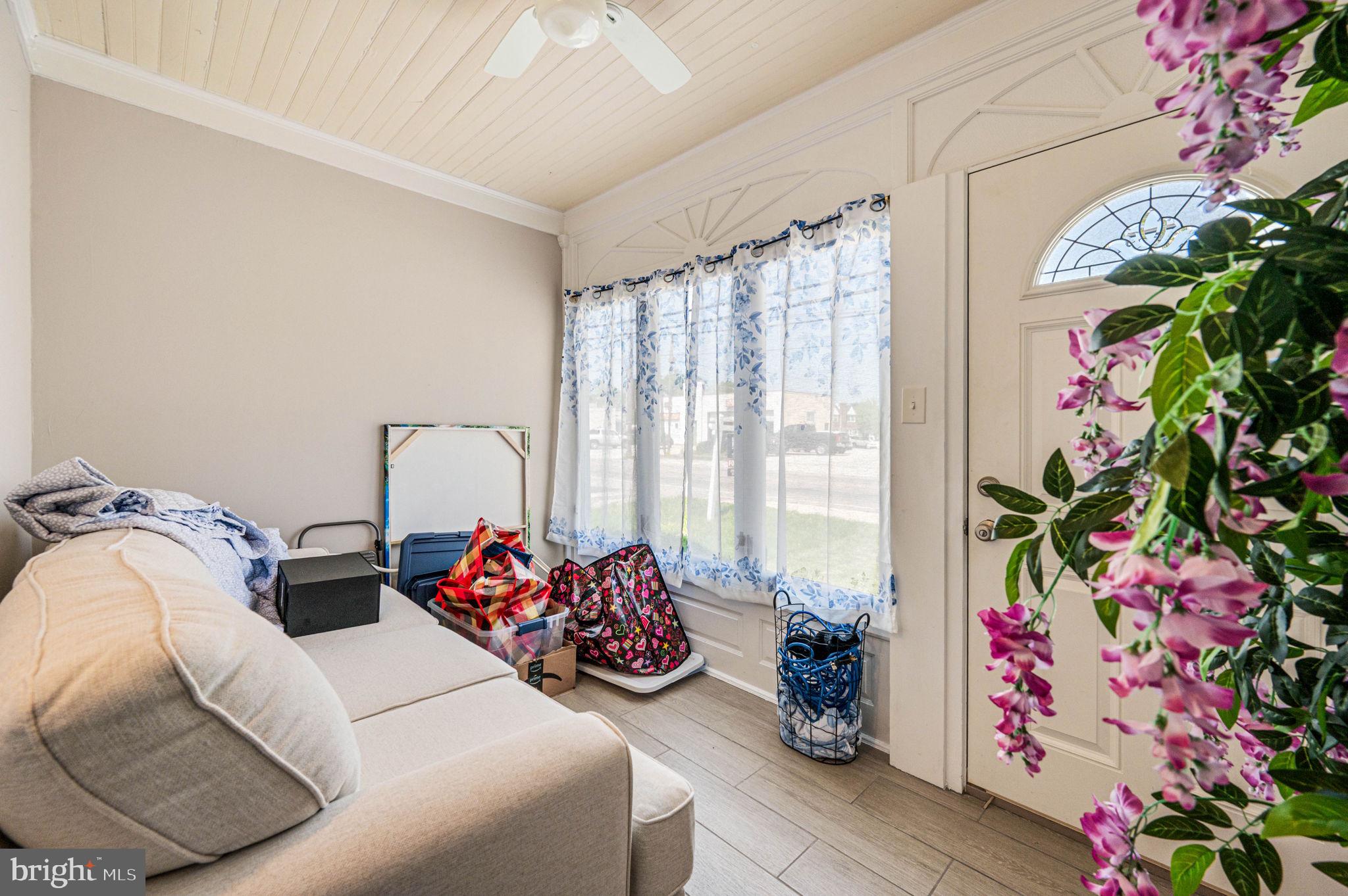 19 State Road Media, PA 19063 - Photo 3 of 18 a bedroom with bed and a potted plant