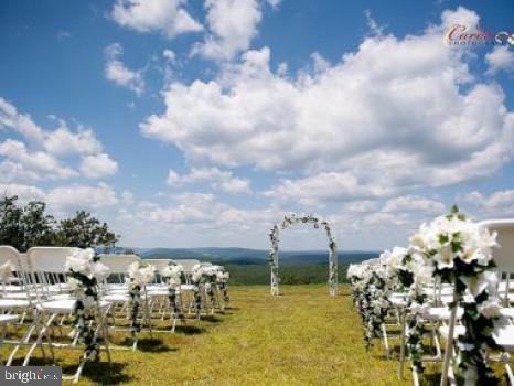 250 Eagle Rock(actually Located On Corral Rd) Hazleton, PA 18202 - Photo 24 of 30 a terrace with boat and lots of trees