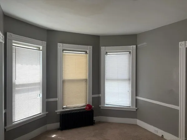 an empty room with window