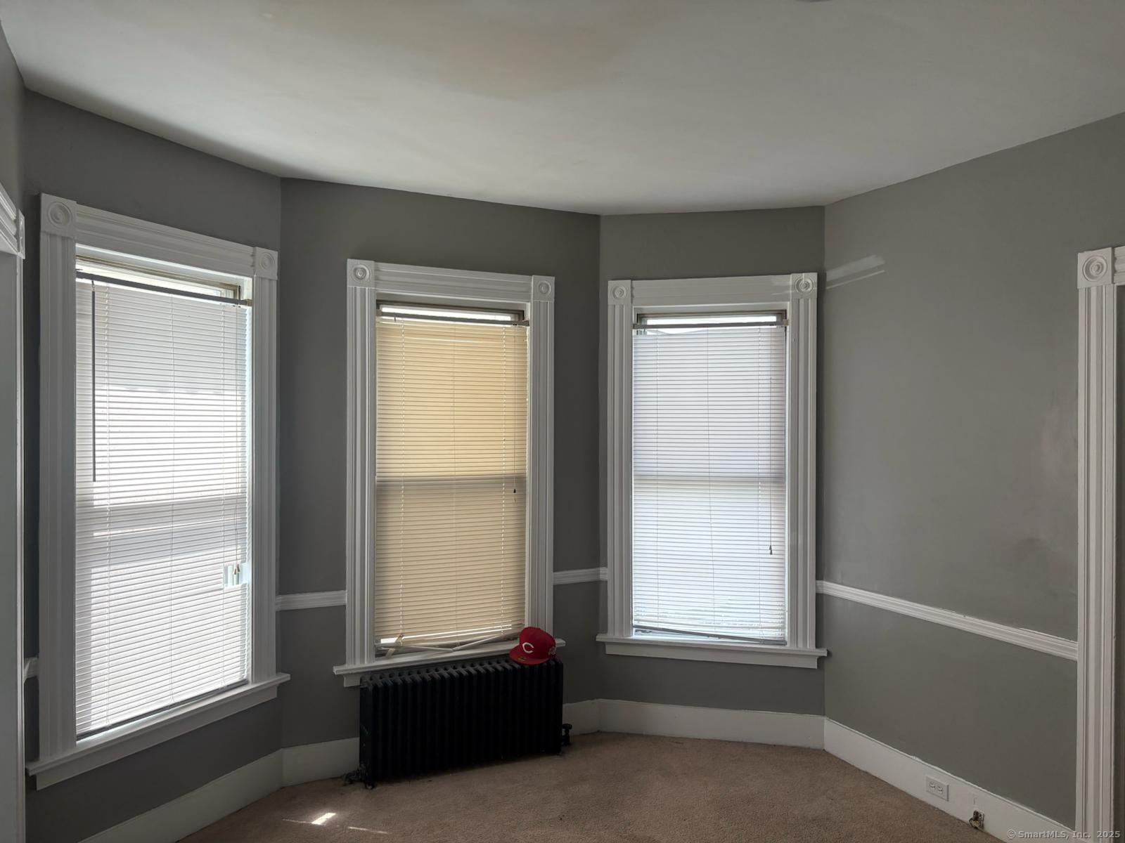 319 Sherman Avenue New Haven, CT 06511 - Photo 14 of 19 wooden floor and window in a room