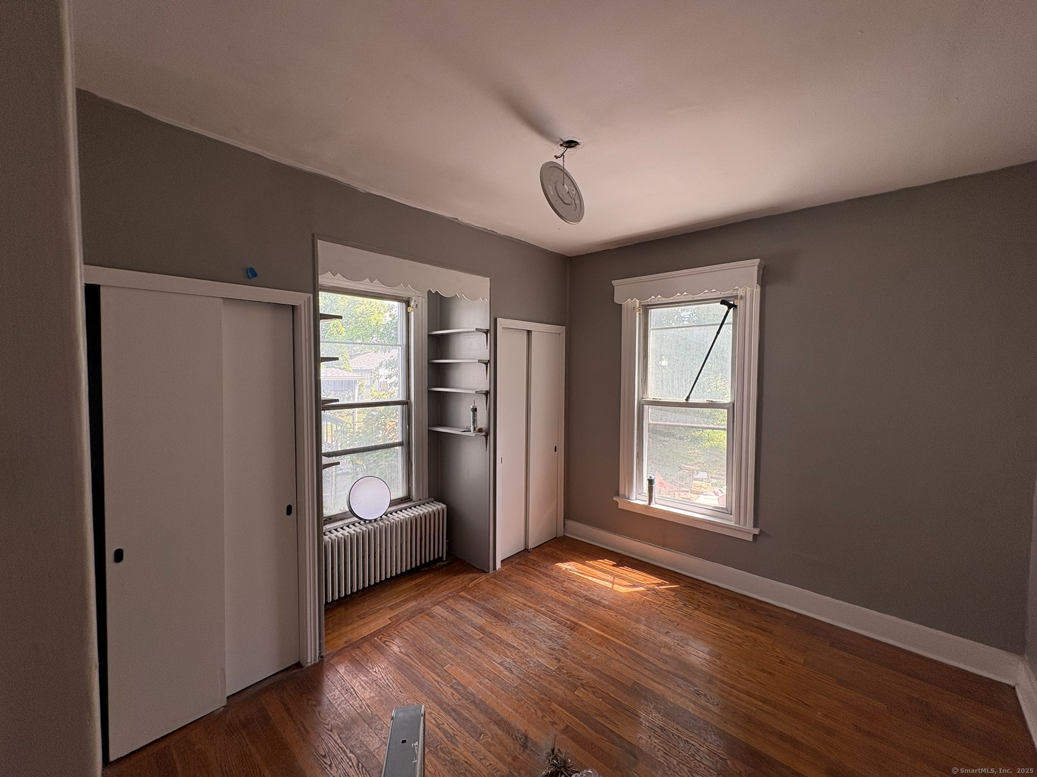 319 Sherman Avenue New Haven, CT 06511 - Photo 19 of 19 an empty room with windows and closet