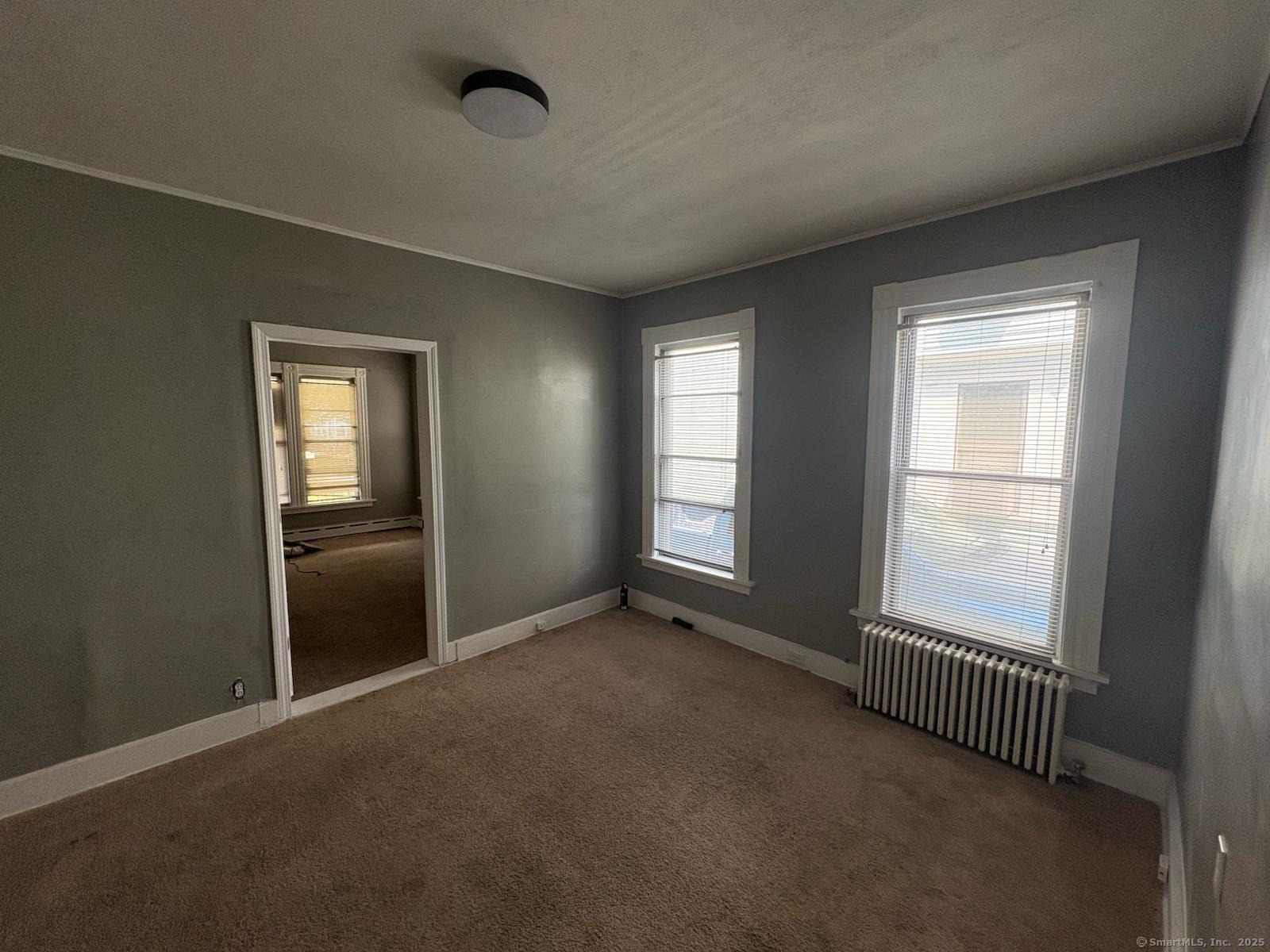 319 Sherman Avenue New Haven, CT 06511 - Photo 10 of 19 an empty room with windows