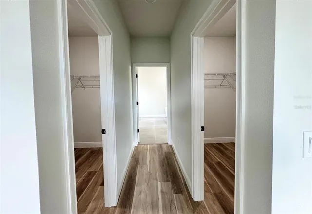 a spacious bathroom with a bathtub and shower