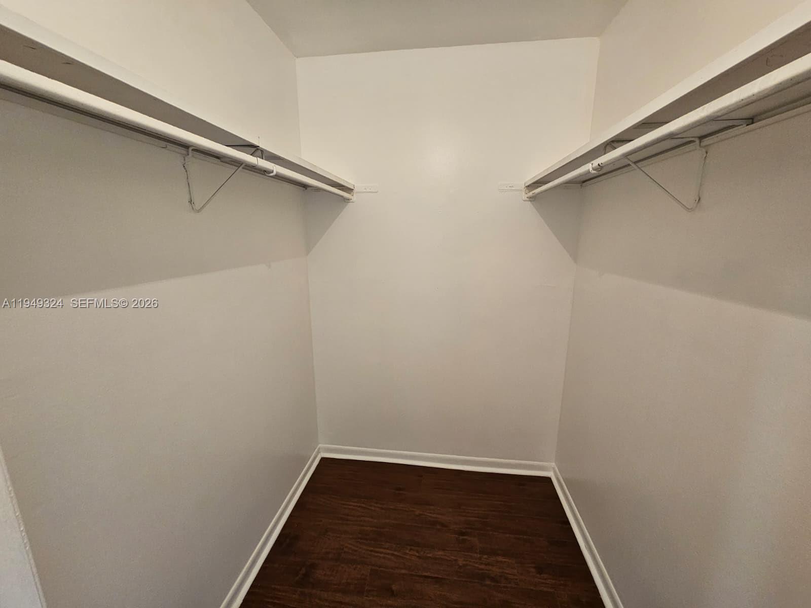 642 Northwest 13th Street, Unit 310 Boca Raton, FL 33486 - Photo 15 of 32 a view of an empty walk in closet