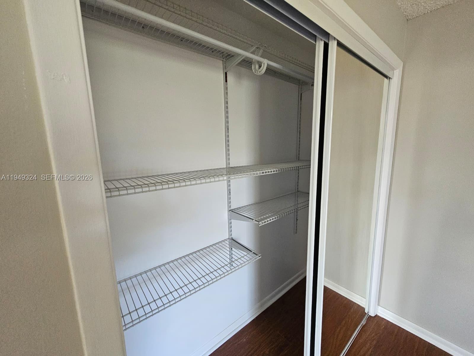 642 Northwest 13th Street, Unit 310 Boca Raton, FL 33486 - Photo 21 of 32 a close view of closet
