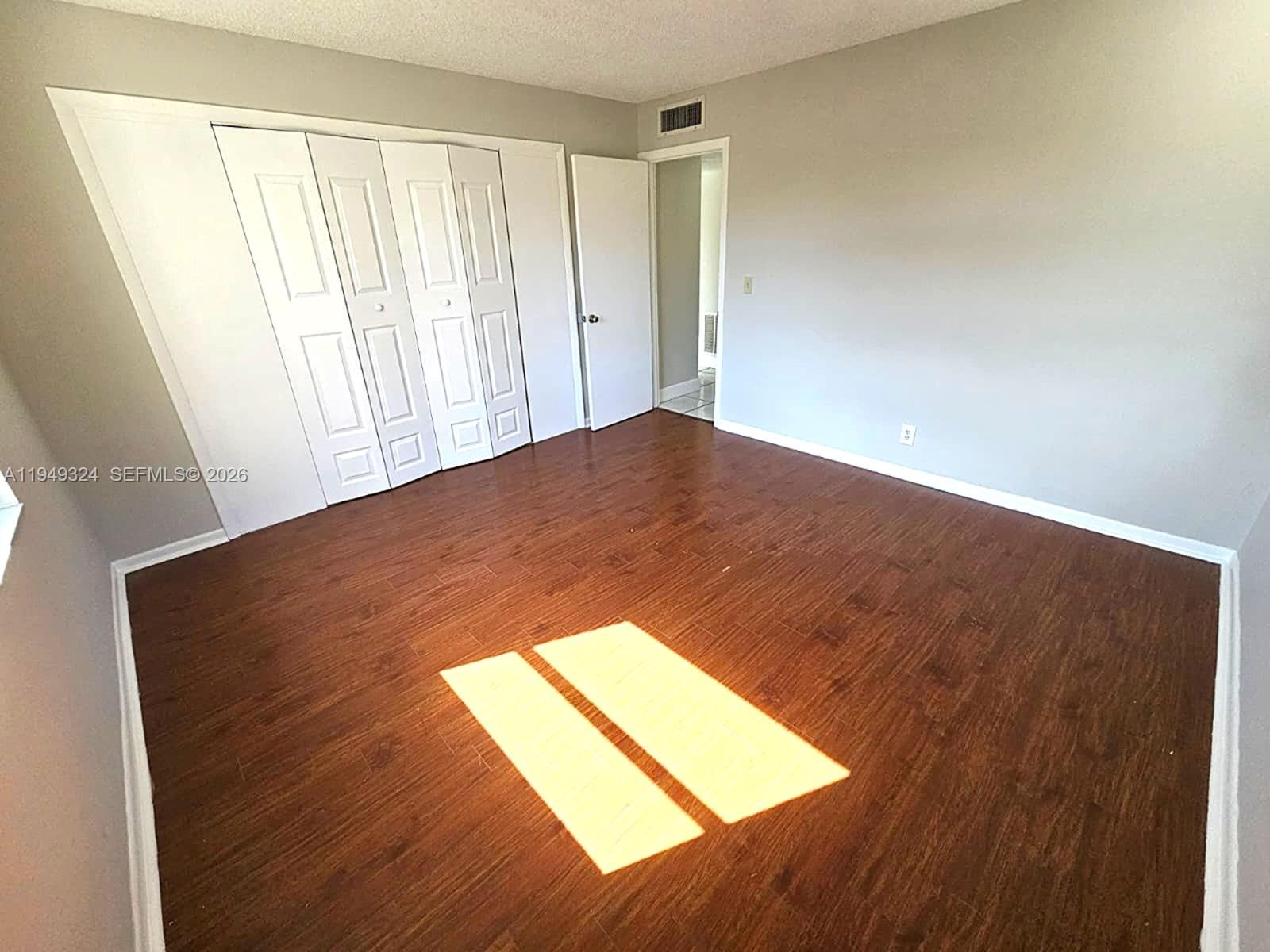 642 Northwest 13th Street, Unit 310 Boca Raton, FL 33486 - Photo 26 of 32 a view of an empty room