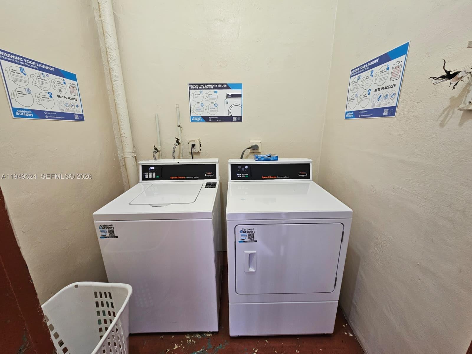 642 Northwest 13th Street, Unit 310 Boca Raton, FL 33486 - Photo 31 of 32 a utility room with dryer and washer