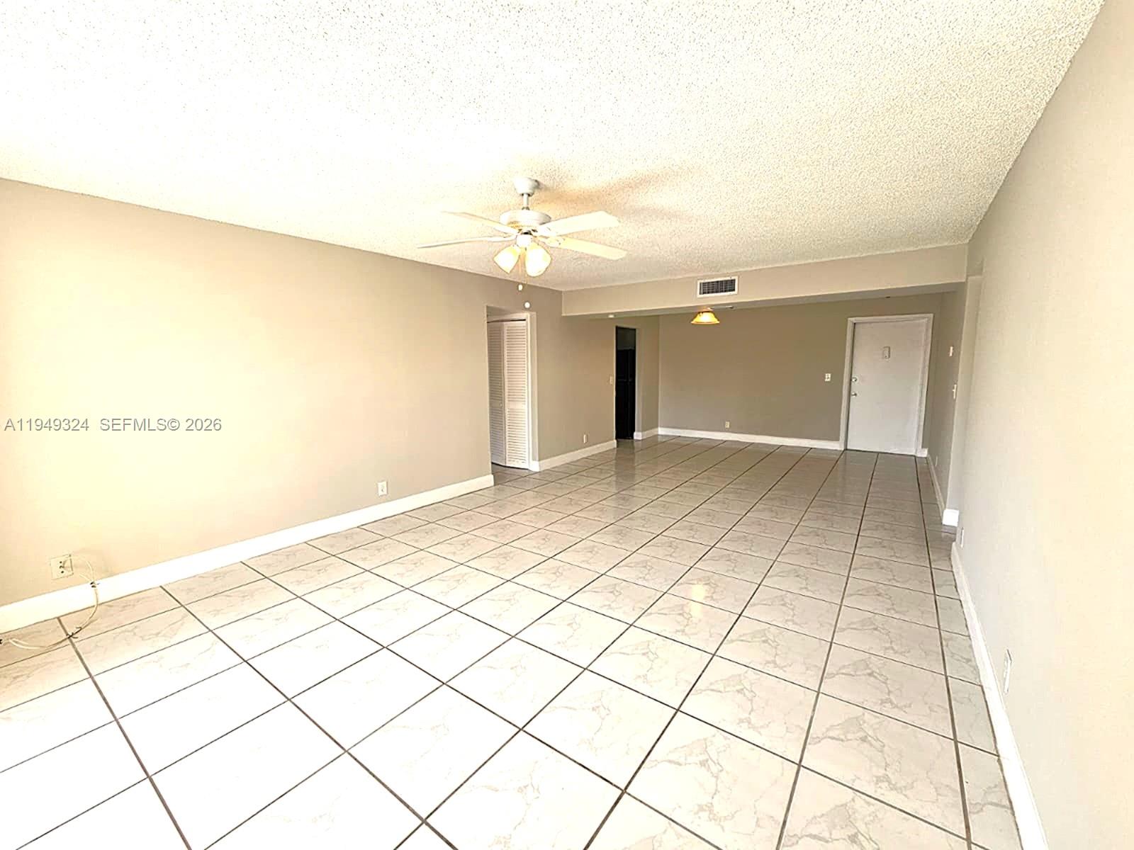642 Northwest 13th Street, Unit 310 Boca Raton, FL 33486 - Photo 4 of 32 a view of an empty room
