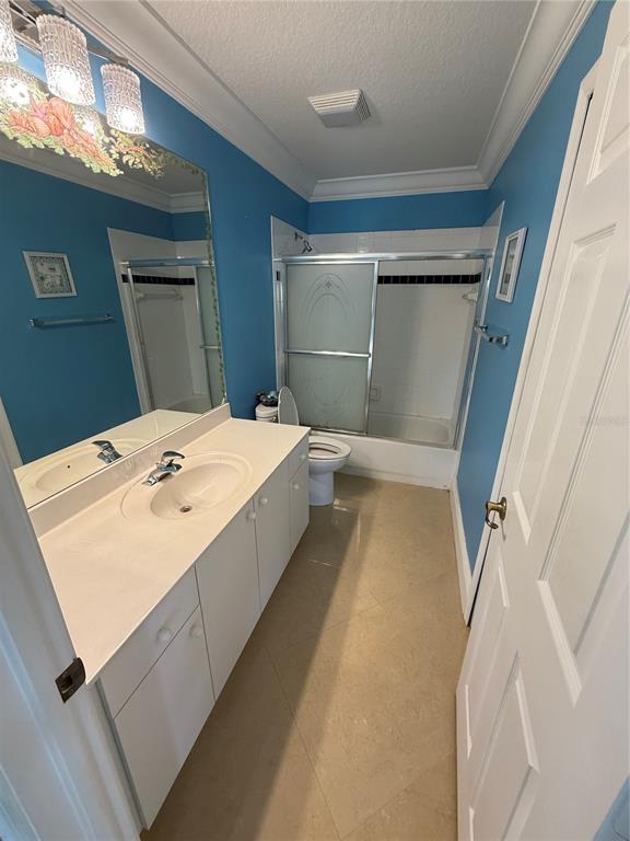 3865 Northwest Deer Oak Drive Jensen Beach, FL 34957 - Photo 28 of 34 a en suite bathroom with a tub and shower