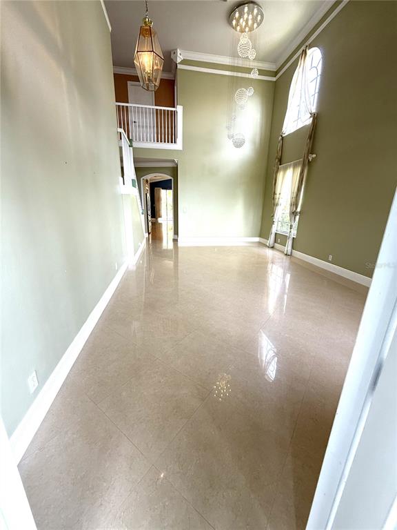 3865 Northwest Deer Oak Drive Jensen Beach, FL 34957 - Photo 3 of 34 a view of empty room with wooden floor
