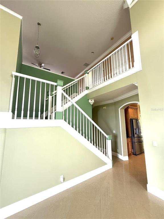 3865 Northwest Deer Oak Drive Jensen Beach, FL 34957 - Photo 5 of 34 a view of staircase and floor