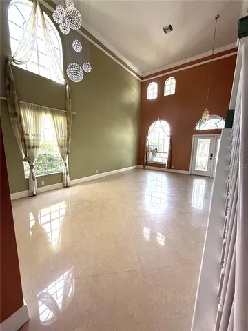 a view of a hallway view with staircase