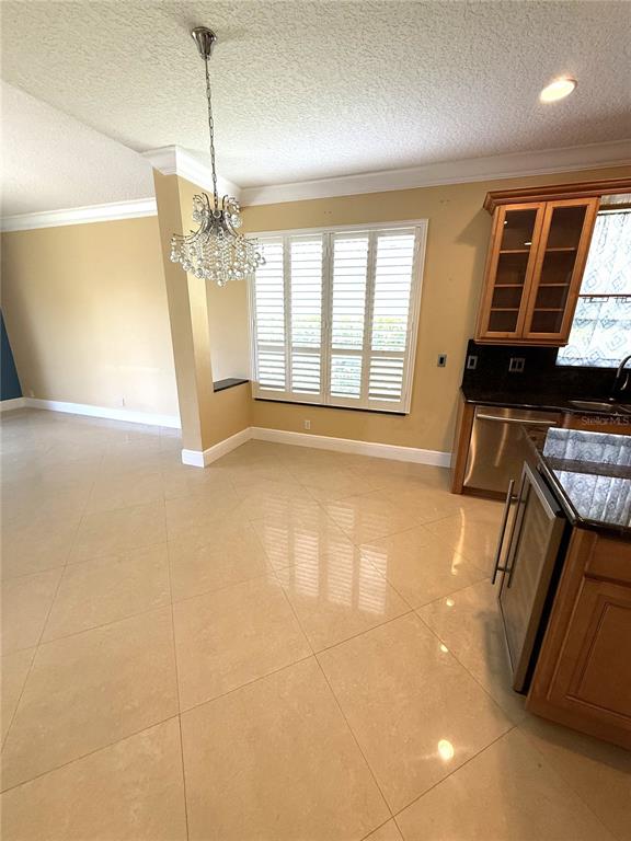 3865 Northwest Deer Oak Drive Jensen Beach, FL 34957 - Photo 9 of 34 a view of an empty room with a window