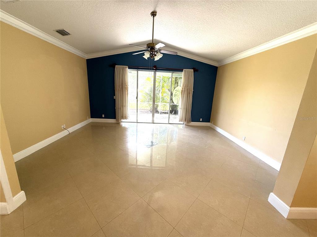 3865 Northwest Deer Oak Drive Jensen Beach, FL 34957 - Photo 10 of 34 a view of an empty room with a window