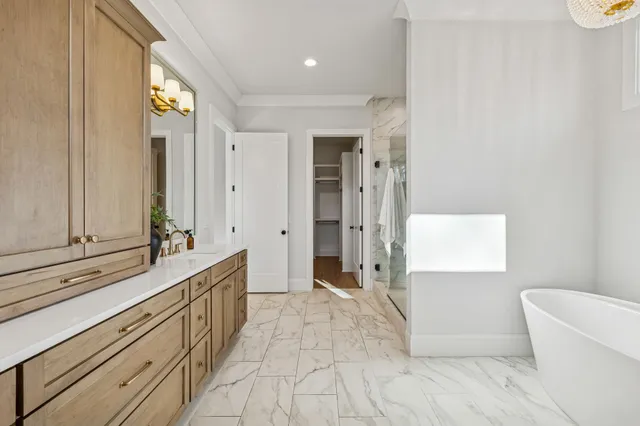 an empty room with ceiling fan and window