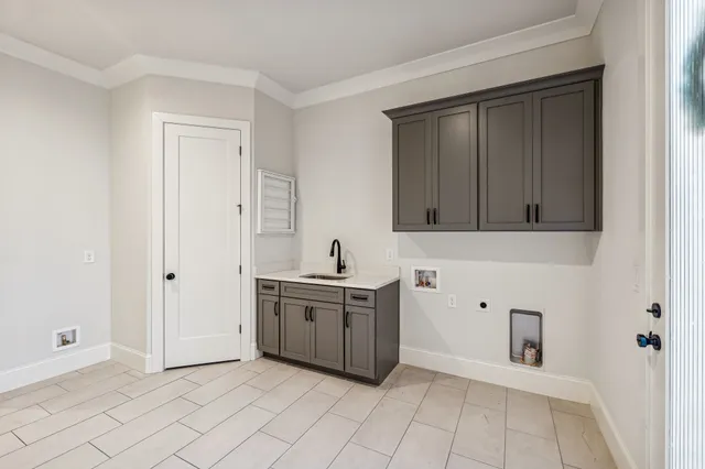 a dining room with furniture water view and a potted plant