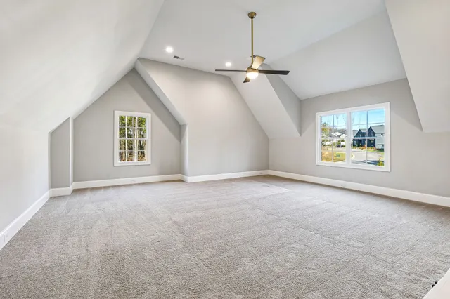 a view of swimming pool with outdoor seating and plants