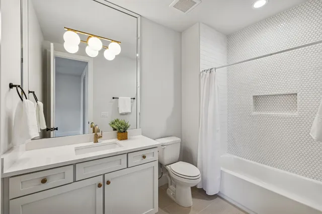 a view of a garden with an outdoor seating