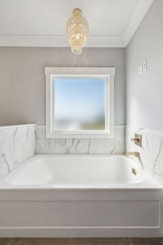 a workspace with furniture and a window