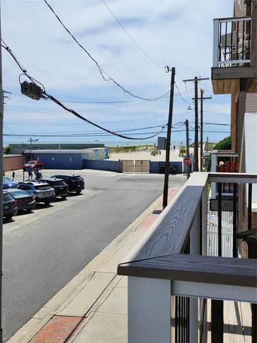 a view of swimming pool with outdoor seating
