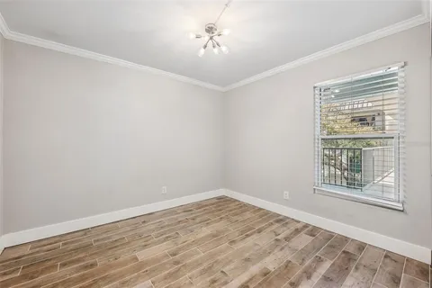 a view of a balcony with a street